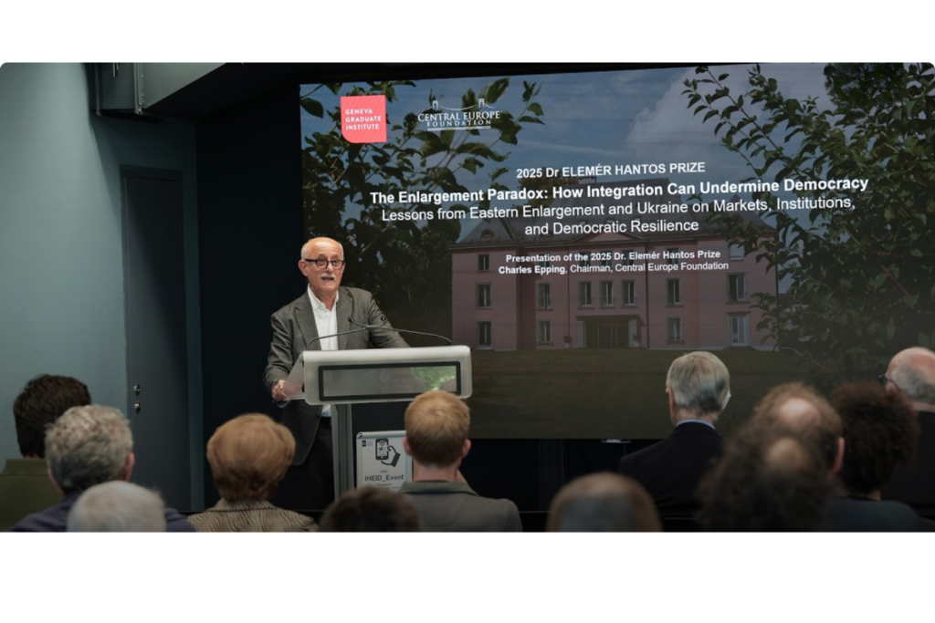 Laszlo Bruszt delivering a lecture behind a pulpit