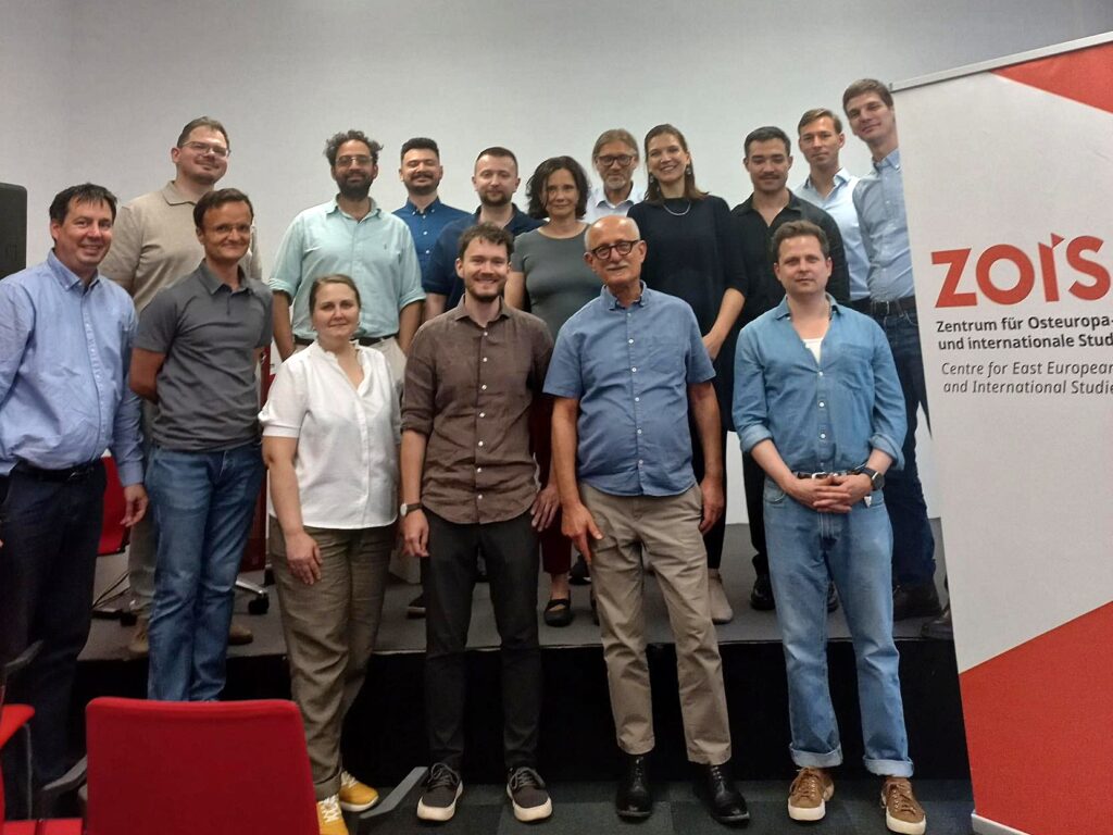 a group of people posing for a photo